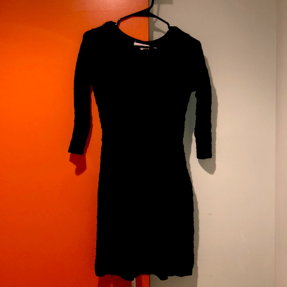 Classic Black Dress with a Twist